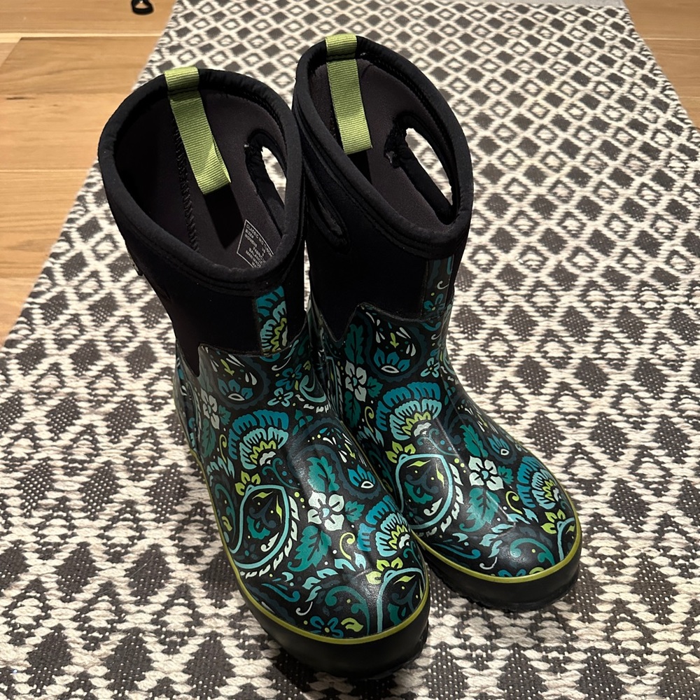 Women’s size 9 Bogs rain boots. Midcalf height with blue and green floral print.